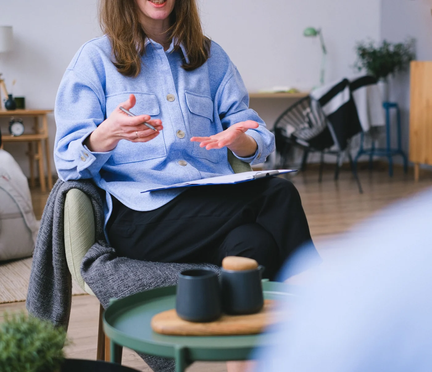 Mental health professional discussing a treatment plan with a patient
