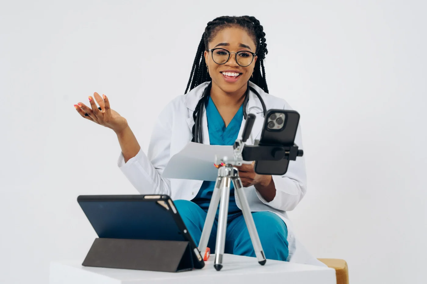 Doctor with a stethoscope and tablet, ready to discuss a skin check