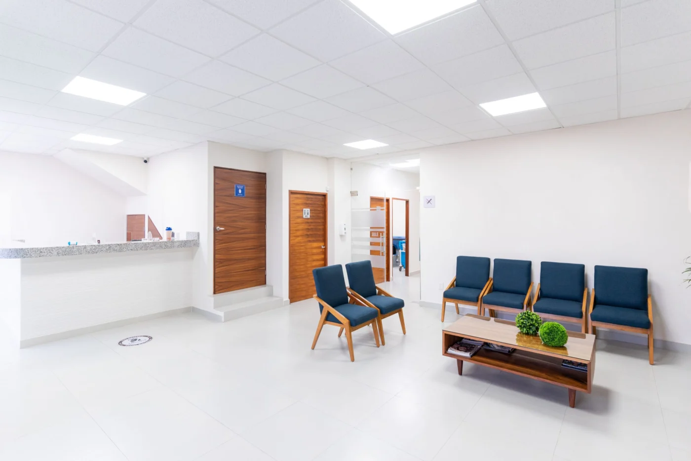 Bright, clean medical clinic waiting room with modern seating